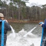 Mississippi Department of Wildlife Spreads Lime to Improve Shadow Lake Water Quality Photos from Mississippi Department of Wildlife, Fisheries, and Parks's post