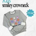 Kids Smiley Face Crewneck Now Available at Northeast Bookstore Get Cozy with Smiles!