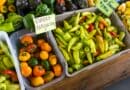 Baldwyn Farmers Market Building Underway, Due by January Assorted peppers on display at a farmers market, illustrating the Baldwyn farmers market building project