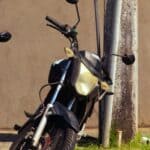 Booneville Motorcycle Crash Kills Prentiss County Man, 70 Parked black motorcycle, illustrating the Booneville motorcycle crash story