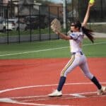 NEMCC Softball Adds Ex-Wheeler Coach Harley Reeder to Staff Female softball pitcher in her stance, illustrating NEMCC softball coaching news