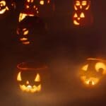 The 5 Best Fog Machines for Alcorn County Halloween Haunts Carved jack-o'-lanterns glowing in a foggy Halloween night — the low-hanging fog effect a fog machine creates.