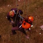 Alcorn County EMA Seeks Technical Rescue Volunteers Rescuers in helmets and harnesses during rope rescue training, illustrating Alcorn County technical rescue