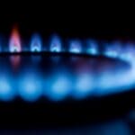 Booneville Gas Billing Error: Customers to Owe Back Pay Blue natural gas flame on a stove burner illustrating the Booneville gas billing error