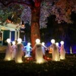 Corinth Police Urge Safe Fall Pranks as Halloween Nears Halloween ghost decorations under a tree in a yard, a scene for Corinth police fall pranks safety tips