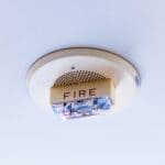 Mississippi Fire Prevention Week Urges Safe Charging Ceiling-mounted fire alarm, a reminder of Fire Prevention Week safety checks