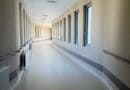 Magnolia Regional Partners With Relias on Hospitalists Bright hospital corridor with windows, illustrating the Magnolia Regional hospitalist partnership