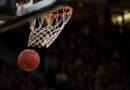 NEMCC Basketball Schedule Has 17 Home Games for 2026-27 Basketball dropping through a hoop, illustrating the NEMCC basketball schedule