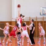 NEMCC Women's Basketball Schedule Has 14 Home Games Women's basketball game in a gym, illustrating the NEMCC women's basketball schedule for 2026-27