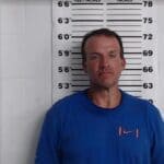Prentiss County deputies report three arrests in traffic stops and checkpoints A booking-style photo shows a man in a blue shirt standing in front of a height chart.