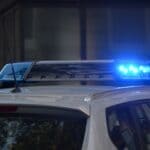 Prentiss County Drug Arrests: Two Booneville Men Charged Blue emergency lights on top of a police car, illustrating the Prentiss County drug arrests